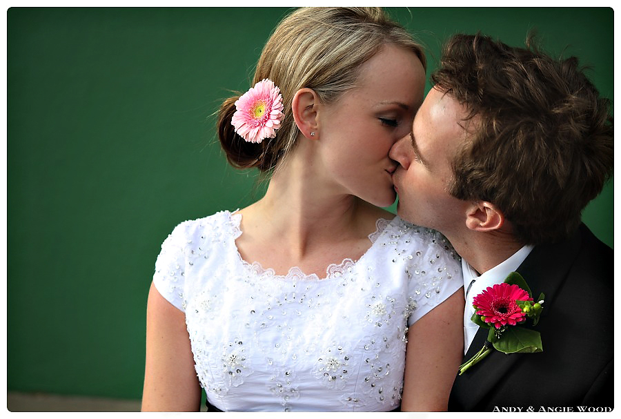 colorado wedding photographers capture bride and groom kissing at denver wedding