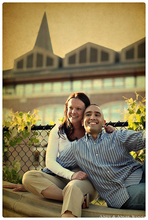 couple sitting and enjoying each other at engagement session