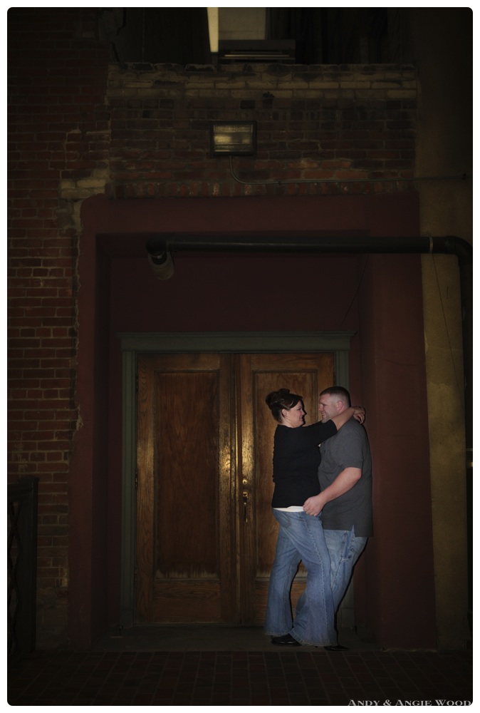 Engaged couple in doorway