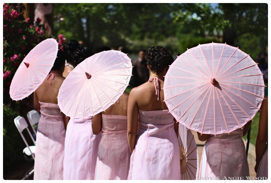 bridesmaids holding umbrellas
