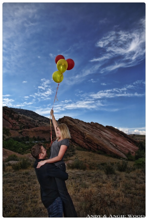 girl being carried off by balloons